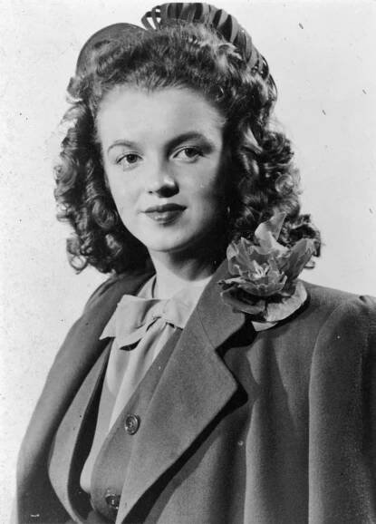 As a teen, she lived at an orphanage and then with a series of foster families. The place where young Marilyn felt happy and safe was at the movies. "I watched all kinds of movies like 'Cleopatra' with Claudette Colbert, and I'd see it over and over and over and over again," she said.