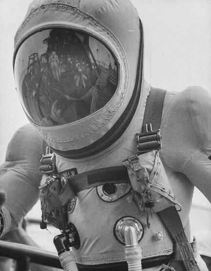 Astronaut James A. Lovell Jr. in a spacesuit before the Gemini 7 flight.