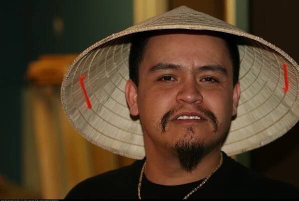 The Man with the Sun Hat