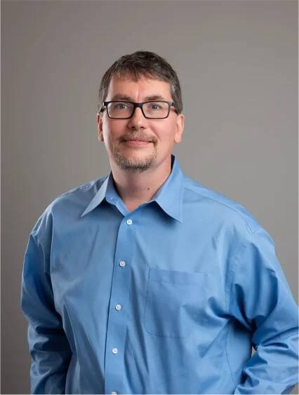 Travis Clark, PhD