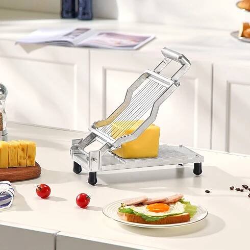 kráječ chleba kráječ sýrů kráječ sýra krájení másla do kuchyně restaurace - Obrázek 22 z 50