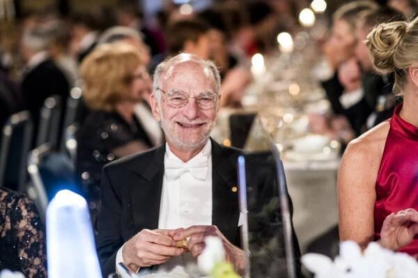 A man sitting at a festive table