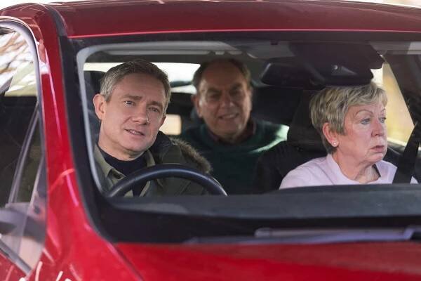 Martin Freeman, Alun Armstrong, and Joanna Bacon in a car.
