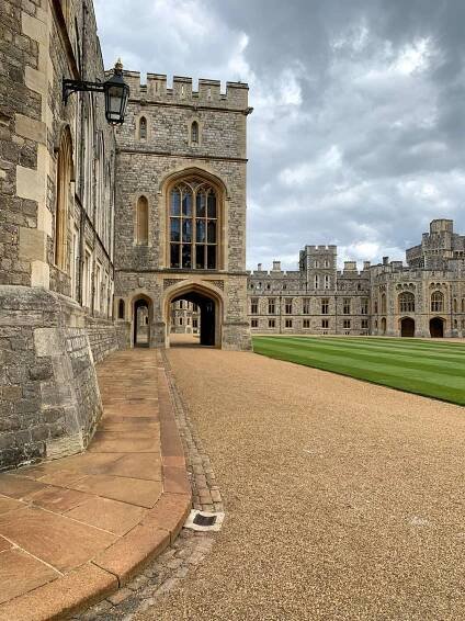 A view of the State and private apartments surrounding a central lawn area at Windsor Castle. A visit to the Castle is a must do during a Windsor day trip