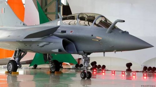 A French Rafale fighter jet in a hanger