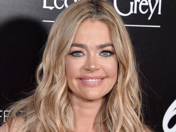 Denise Richards wows in figure-hugging bodycon dress - and wait until you see her hair