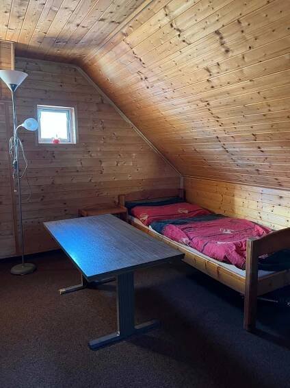 Postel nebo postele na pokoji v ubytování Ubytko v Průhonu
