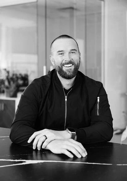Portrait of Tyler Hall, chief revenue officer at Signal