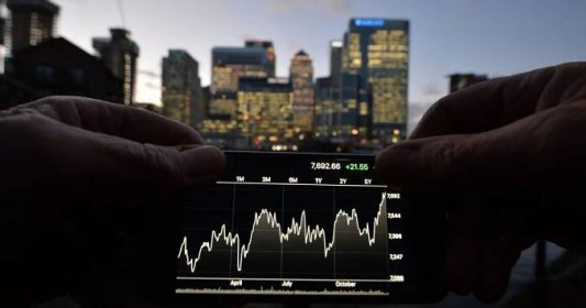FTSE 100 ends year with small rise but lags behind US rival