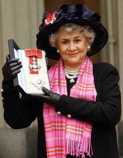 Joan Plowright poses for pictires after being made a Dame by the Prince Of Wales at Buckingham Palace in London, 20 February, 2004. Dame Joan, who is the widow of Lord Olivier, is considered one of the greatest actresses of her generation in 2004.
