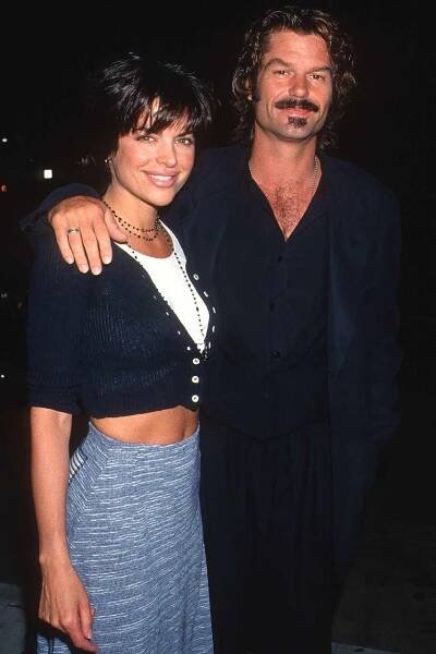 American couple, actors Lisa Rinna and Harry Hamlin attend an 'LA Law' wrap party at Tatou Restaurant, Beverly Hills, California, May 11, 1994.