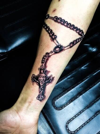 Rosary tattoo Done by Blacky  Blacky's Tattoo Studio | Elegant tattoos, Arm tattoos for guys, Rosary tattoo