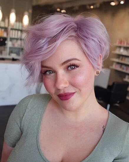Soft lavender pixie cut with feathered layers and side-swept bangs for short fine hair