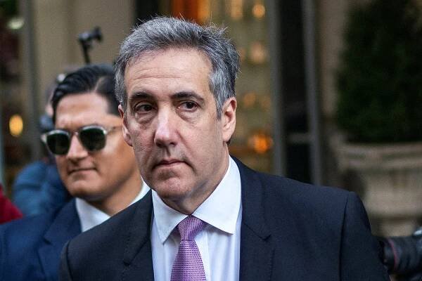 FILE PHOTO: Michael Cohen departs home to testify in Republican presidential candidate and former U.S. President Donald Tr...