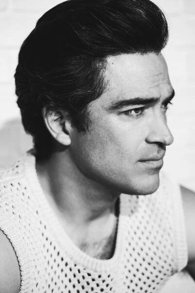 “I’ll tell you a story,” smiles Alfonso Herrera. “Not so long ago, I was in Los Angeles. I was on the freeway in an Uber, and the driver asked me, ‘What do you do?’ I said I’m an actor. I didn’t want to be very specific. And he said, ‘Okay. What have you done lately?’ Ozark. ‘Really? I’ve watched the whole thing. Who are you?’ He then pulled off the freeway and stopped. Going against all the protocols, he asked me to take my mask off, so I did. ‘I have Javi!! I have Javi!!’ He started screaming and yelling with excitement.