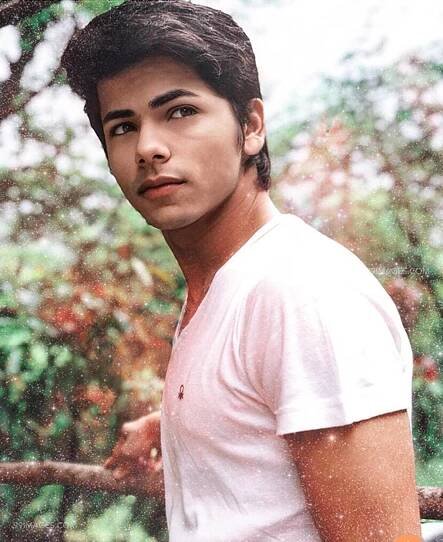 Siddharth Nigam Cool Pose in White Shirt Wallpaper