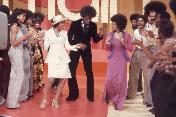 Don Cornelius dances down the Soul Train Line with Jean Terrell and Lynda Laurence of the Supremes on Soul Train episode 62, aired 5/26/1973. 