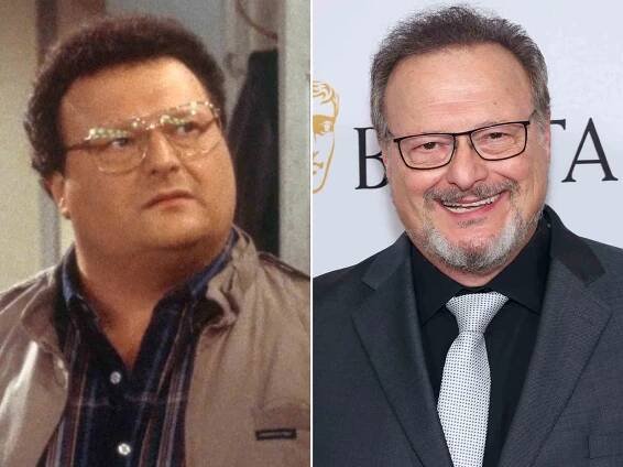 Wayne Knight as Newman in 'Seinfeld'. ; Wayne Knight attends The BAFTA Tea Party in 2023.