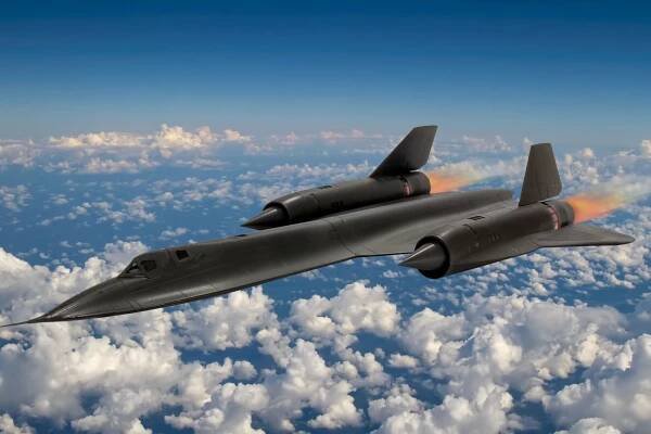 A SR-71 Blackbird Flying above the clouds.