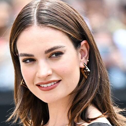 Lily James Matched Her Manicure to Her Cozy Gray Sweater — See Photos