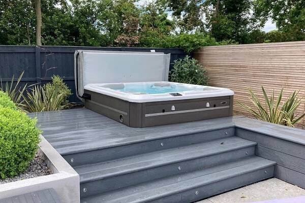 Hot tub half sunken on decking