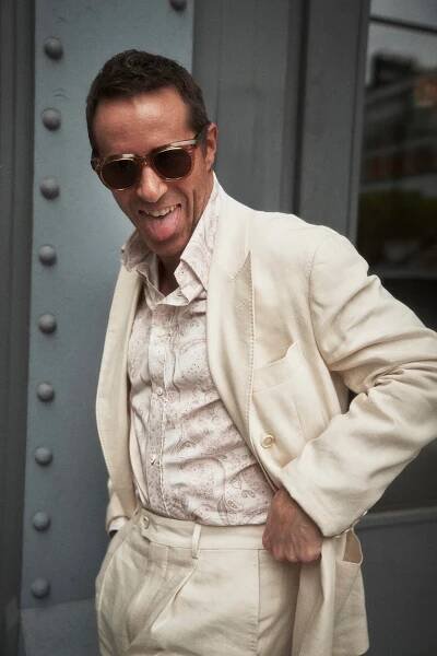 Linen suit, paisley shirt by BRUNELLO CUCINELLI;sunglasses by JACQUES MARIE MAGE.