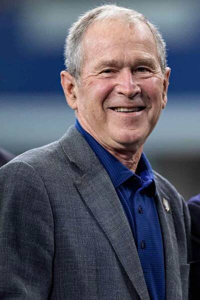 Former President George W. Bush on the sidelines during a game between the Green Bay Packers and the Dallas Cowboys at AT&T Stadium on October 6, 2019 in Arlington, Texas.