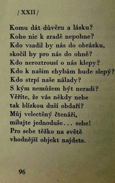 an old book with some type of text written in black on the front and back