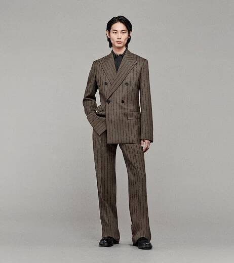 Model wearing Pinstripe Double-Breasted Tailored Jacket with Tailored Trousers in Coal and Fig
