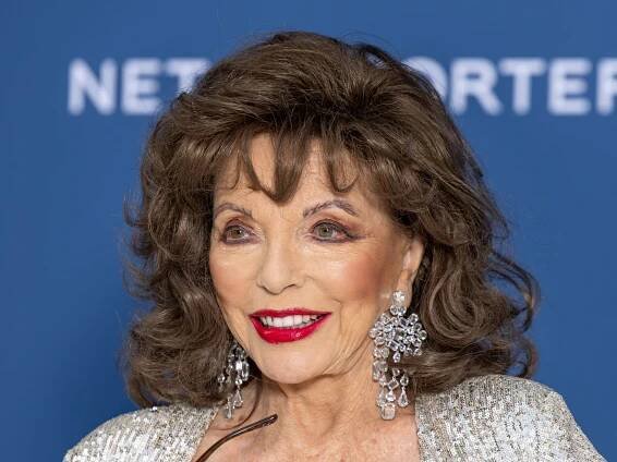 Joan Collins 'exuberates confidence' in mini-shorts at 92