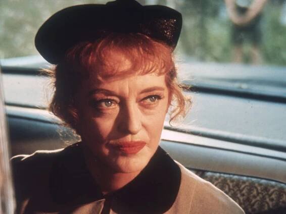 Forget Bette Davis' eyes, her 1950s living room features the romantic trend we're coveting for 2026 – it proves that floral curtains are truly timeless