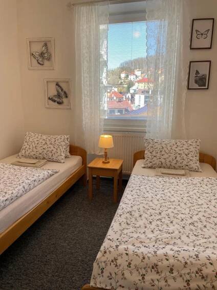 Postel nebo postele na pokoji v ubytování Penzion Ječmínek