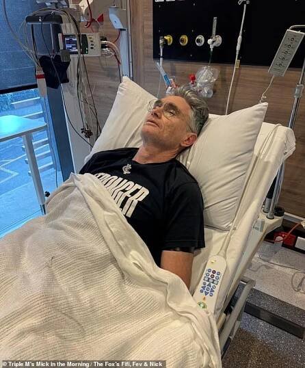 Funnyman Hughes ended up in intensive care (pictured) in a Melbourne hospital after copping several hits in the exhibition game