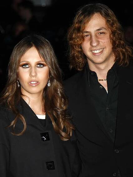 Daniel Versace Beck and Allegra Versace Beck pose before Versace shows during the Men's Ready-to-Wear Autumn/Winter 2008 collections on January 12, 2008.