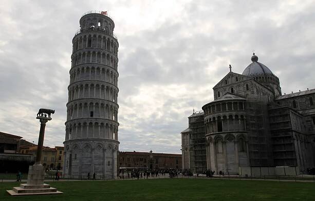 The Leaning Tower of Pisa and the Cathedral at the Piazza del Duomo (also known as the "Piazza dei Miracoli" or "Square of Miracles").