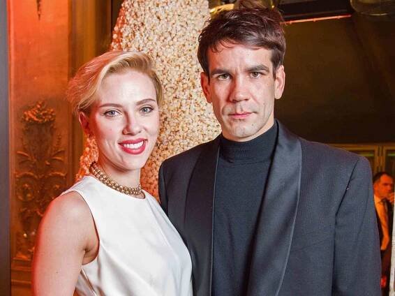 Scarlett Johansson and Romain Dauriac attend the Yummy Pop Grand Opening Party at Theatre du Gymnase on December 16, 2016 in Paris, France