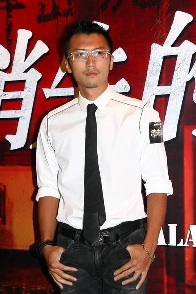 Hongkongský herec Nicholas Tse představuje jak dorazí na červeném koberci na premiéru filmu jeho nejnovější film, The Bullet se vytrácí, v Hongkongu, Číně, 9 září 2012. — Stock obrázek