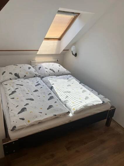 Posteľ alebo postele v izbe v ubytovaní Apartmány u Kubíků