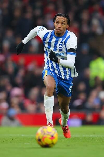 Joao Pedro of Brighton & Hove Albion running with the soccer ball.