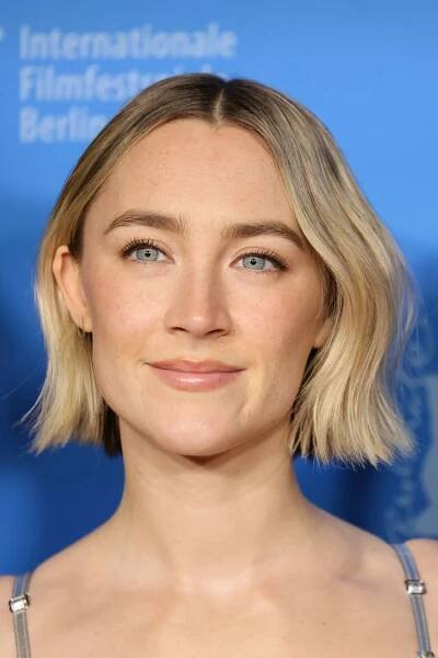 Saoirse Ronan blonde bob with textured waves and center part
