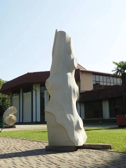 “Poetic Amalgam,” measuring 200 x 60 x 60 cm and executed in sandstone.