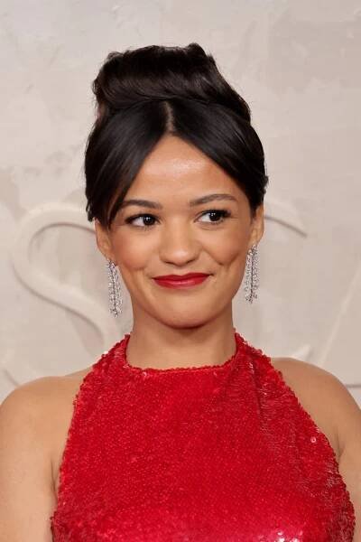 Bode wore her hair in a soft chignon atop her head to complement her RVNG Couture halter dress