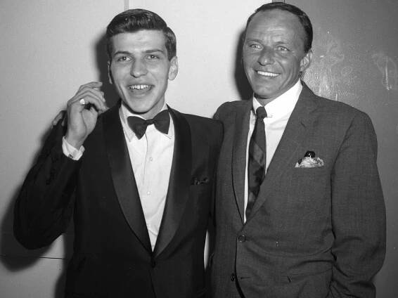 Frank Sinatra Jr, and Frank Sinatra Sr. at the Hotel Americana, following Jr's performance at 