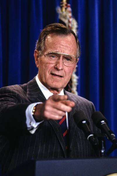 George H.W. Bush gave pardons to many involved in the Iran-Contra scandal.