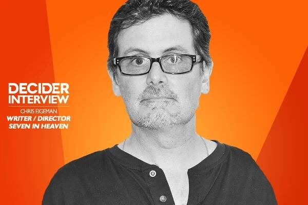 Chris Eigeman n black and white on a bright orange background