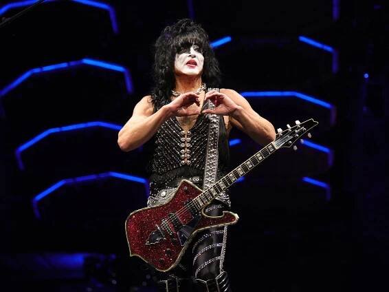Paul Stanley of Kiss at their final show in New York. He appears to be making a heart-shape with his hands.