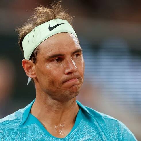 French Open day two: Rafael Nadal makes early exit but Iga Swiatek progresses