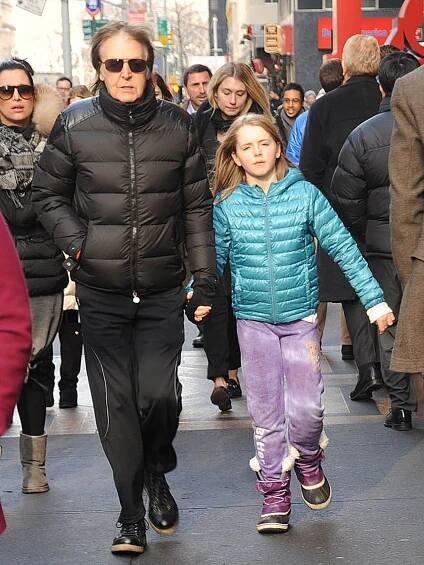 Paul McCartney and his daughter, Beatrice McCartney, are seen on December 19, 2013 in New York City.