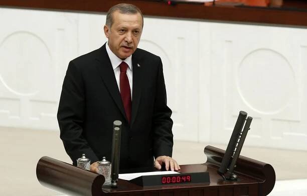 Turkey's new President Erdogan attends a swearing in ceremony at the parliament in Ankara