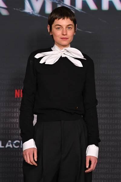 Image may contain Nomie Merlant Clothing Formal Wear Suit Person Accessories and Tie